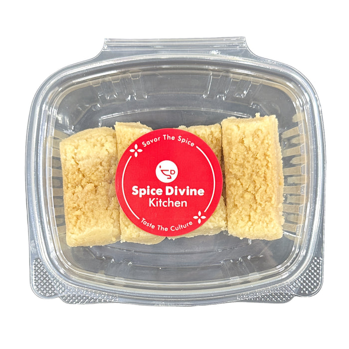 Divine Sweets Milk Cake Small — rectangular pieces of Indian milk sweet with creamy-to-golden gradient