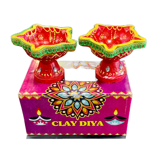 Globex Impex Divine Fancy Stand Diya 2 Pcs — pair of red star-shaped clay diyas on stands with gold and green accents